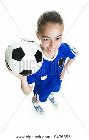 girl in sport wear with football isolated on white background