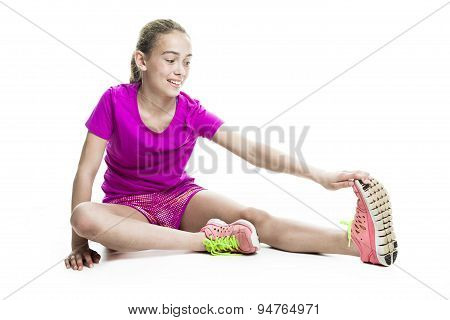 running young girl in sport cothes, white background