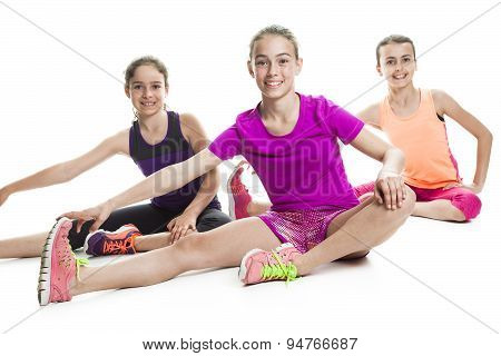 running young girl in sport cothes, white background