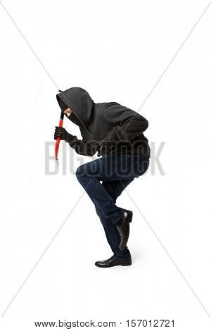 Burglar in mask with passkey