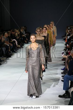 KYIV, UKRAINE - OCTOBER 13, 2016: Models walk the runway at A.M.G. collection show during the 39th Ukrainian Fashion Week at Mystetsky Arsenal in Kyiv