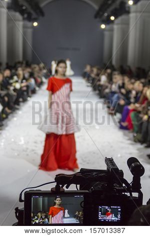 KYIV, UKRAINE - OCTOBER 13, 2016: Televison camera broadcasting a show during the 39th Ukrainian Fashion Week at Mystetsky Arsenal in Kyiv