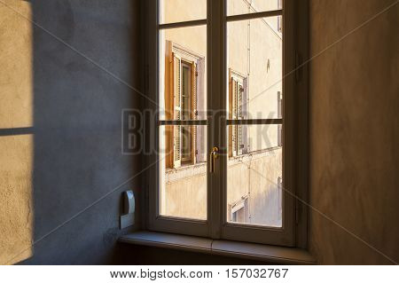 Perspective shadow of sun through window frame in watercolor-like colors