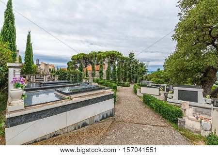 Virgin Mary church on graveyard in Tucepi, Croatia.