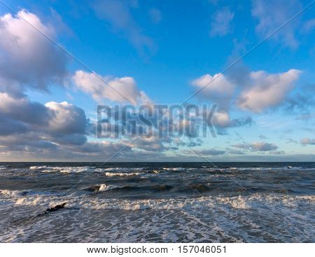 the waves of the sea Sunny day, beautiful clouds