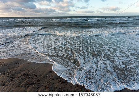 the waves of the sea Sunny day, beautiful clouds