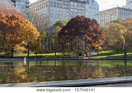 Lake And Autumn Trees On Central Park, New York