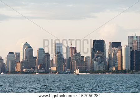 Manhattan skyline from bay just before sunset