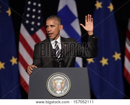 Athens Greece Nov 16 2016:U.S. President Barack Obama waves to the crowd as he delivers a speech at the new opera of Athens on Wednesday