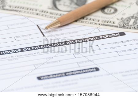 Close-up of patient information PAYMENT conceptStetoscope and medicinepen and money on patient form on the desk.