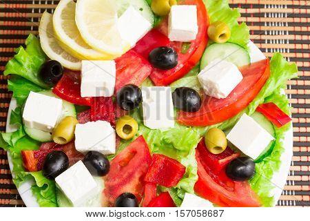 Greek salad with feta cheese and olives