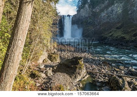 A view of Snoqualmie Falls from downriver.