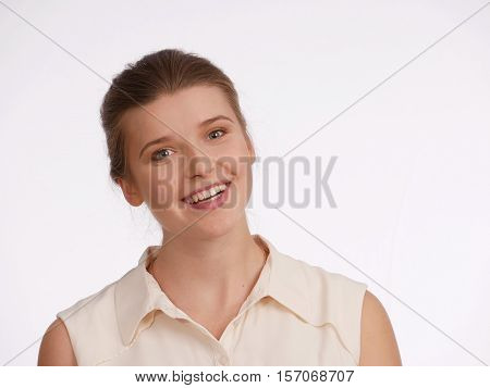 Emotion - happynes. Girl's head, laughing, on white bacground, light colors on back. Shoulder portrait. Horisontal.