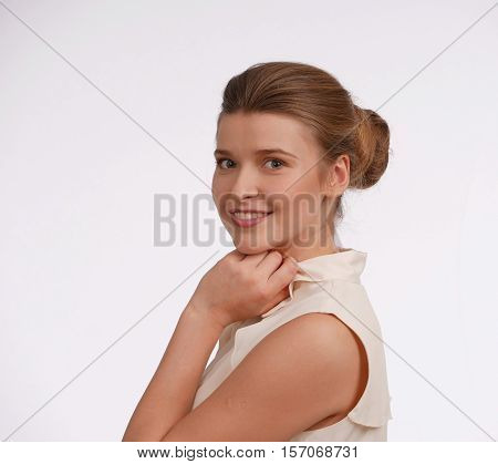 Emotion - happynes. Girl's head, laughing, on white bacground, light colors on back. Shoulder portrait. Horisontal.