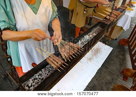 Preparation Of Street Food Many Skewers With Lamb Meat Cooked Gr