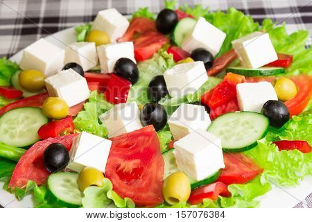Greek salad with feta cheese and olives