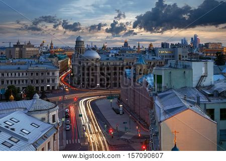 Ilinka street in center of Moscow, Kremlin far away at cloudy morning in Russia
