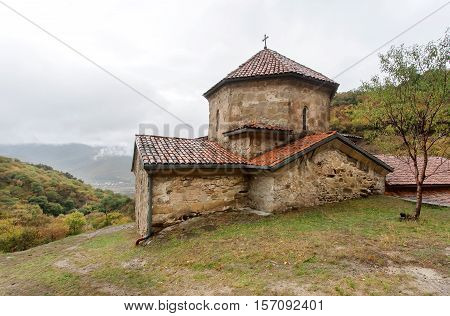 St. John the Baptist orthodox church as part of complex Shio-Mgvime Christian monastery, built in green forest in 6th century in Mtskheta, Georgia.