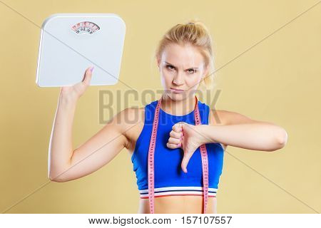 Sad Woman With Weight Gain Thumb Down Sign