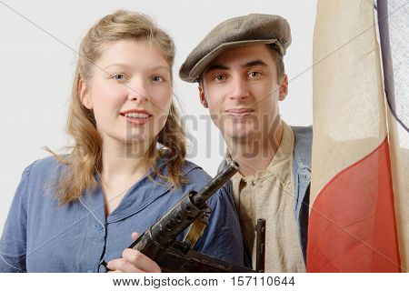 young couple of french resistant to the Paris liberation in 1944