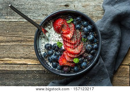 Greek yogurt with berries and hemp seeds. A healthy snack or meal.