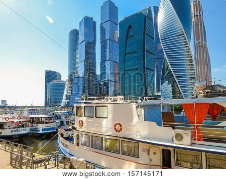 MOSCOW, RUSSIA - JULY 17, 2016: Moscow skyline. Modern skyscrapers in business district and river ships on the Moscow River