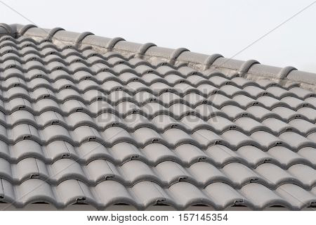 Rows of roof tiles on the top of house Isolated white background.
