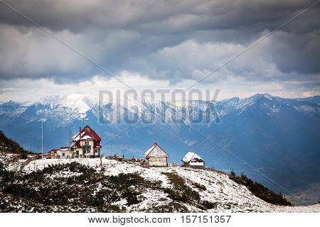 view on foggy valley in winter from Rodna Mountains in Transylvania - Romania