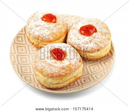 Plate with tasty donuts on white background. Hanukkah celebration concept
