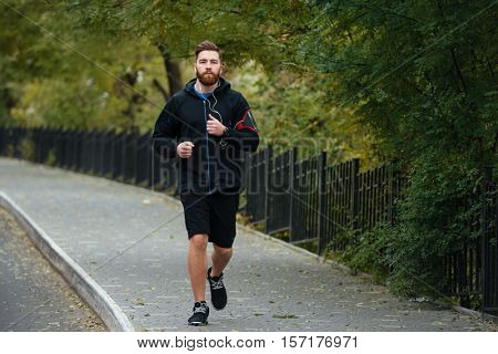 Front view of full length runner in park