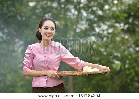 A local farmer in Laos looks pretty.