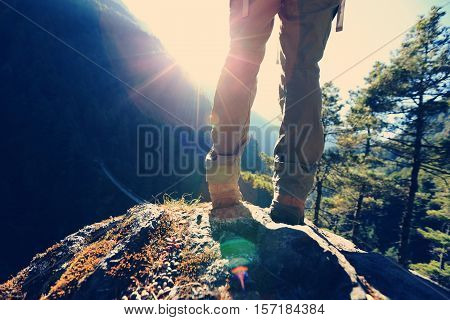 successful hiker enjoy the sunrise at the himalaya mountains