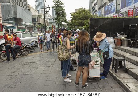 BANGKOK THAILAND - OCT 2 : Unidentified people in front of CentralWorld of Ratchaprasong area on october 2 2016 thailand. Ratchaprasong is famous landmark of Bangkok