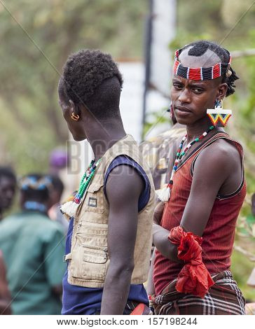 Boys From Ari Tribe At Local Village Market. Bonata. Omo Valley. Ethiopia.