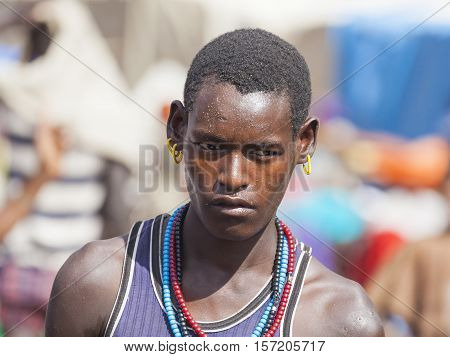 Boy From Ari Tribe At Village Market. Bonata. Omo Valley. Ethiopia.