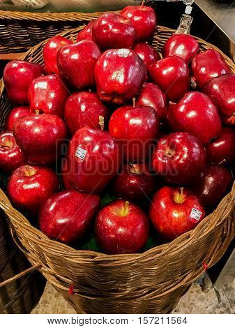 Group of red apples in basket , Available in the Market