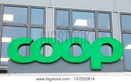Solna Swedenn - February 23 2015: Close up of the sign above the Coop Sweden head office main entrance at the street address Englundsvagen 4.