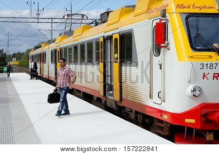 Lammhult Sweden - May 27 2015: Electric rail car set of class X11 in service for Krosatagen at Lammhult station exchange passengers.