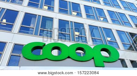Solna Sweden - March 16 2016: Close up of the sign above the Coop Sweden head office main entrance at the street address Englundsvagen 4.