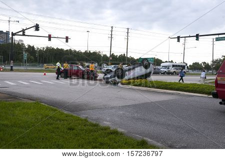 Orlando Florida - September 15th 2009: Vehicle rollover accident at major intersection in Orlando Florida September 15th 2009