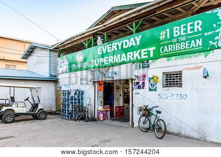 Placencia, Belize - August 29 2016: Supermarket storefront in Caribbean town of Placencia, Belize, Central America