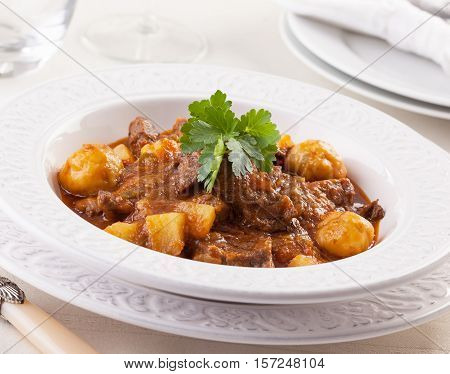 Traditional Hungarian goulash made with beef tomato pepper chili smoked paprika.
