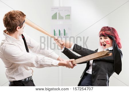 Concept Of Hit War Woman Against Man In The Workplace