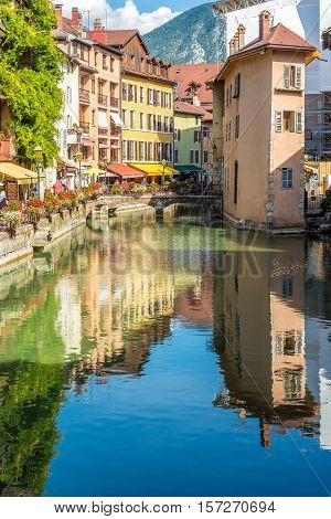 ANNECY,FRANCE - SEPTEMBER 2,2016 - Street reflection in river Thiou of Annecy. Annecy is the largest city of Haute Savoie department in the Auvergne Rhone Alpes region in southeastern France.