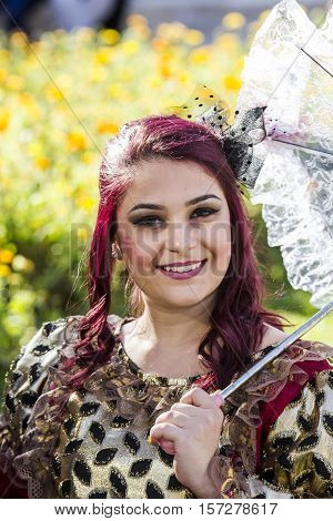 CAGLIARI, ITALY - May 29, 2016: Sunday at La Grande Jatte VIII Ed. At the Public Gardens - Sardinia - portrait of a beautiful girl in Victorian costumes