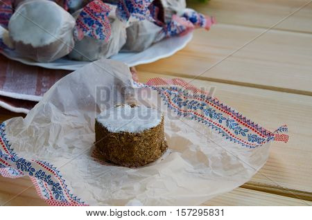 Close up of homemade polvoron typical sweets consumed in Spain at Christmas. Spanish shortbread on wood background.