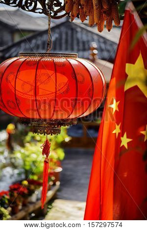 Traditional Chinese Red Lantern And The Flag Of China