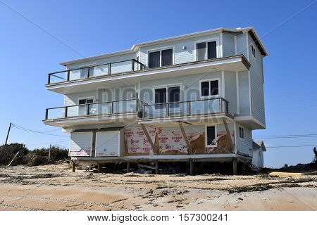VILANO BEACH, FLORIDA, USA - NOVEMBER 9, 2016: Aftermath of beach house damage caused by hurricane Matthew hitting the east coast of Florida on October 7, 2016.