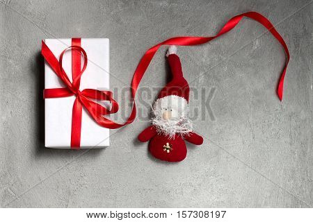 beautiful New Year's or Christmas gift on a gray background
