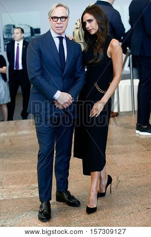 NEW YORK-MAY 5: Tommy Hilfiger (L) & Victoria Beckham attend the ribbon cutting ceremony for Anna Wintour Costume Center Grand Opening at Metropolitan Museum of Art on May 5, 2014 in New York City.